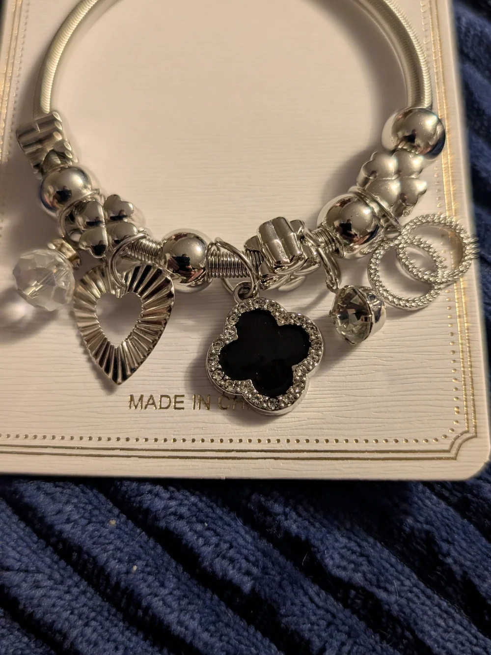 Silver Charm Bracelet with Black Clover Pendant